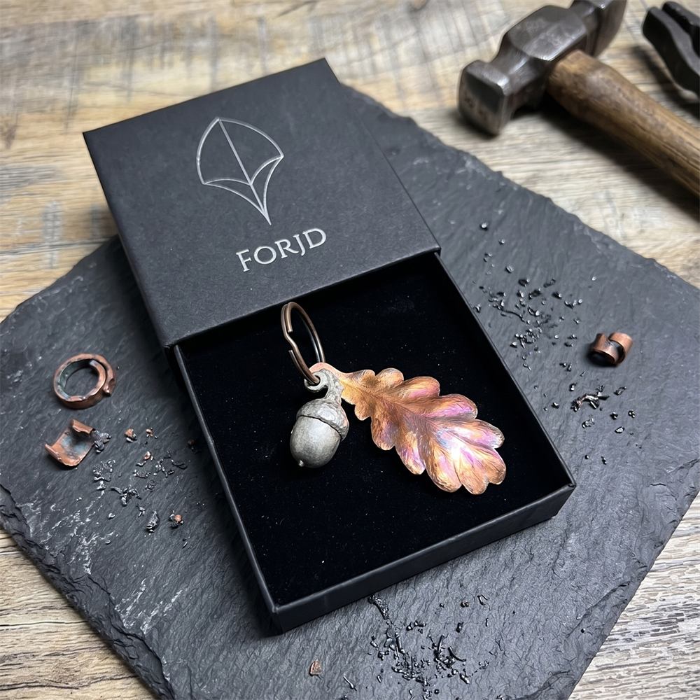 A personalised copper leaf, boxed